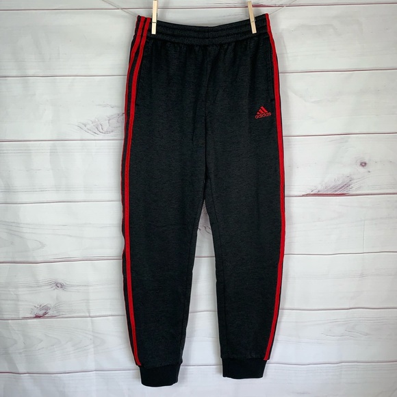 black adidas joggers red stripes